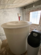 Water softener and backup water tank